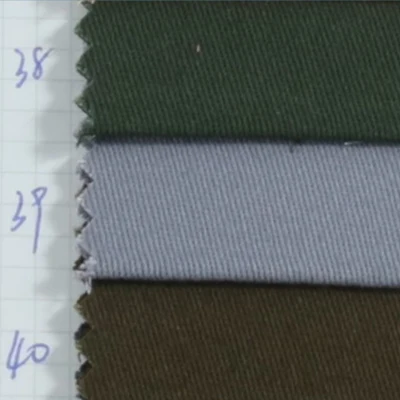 Stock de mode 100 coton tissé carbone pêche sergé Spandex Design tissu teint pour tissu de vêtement